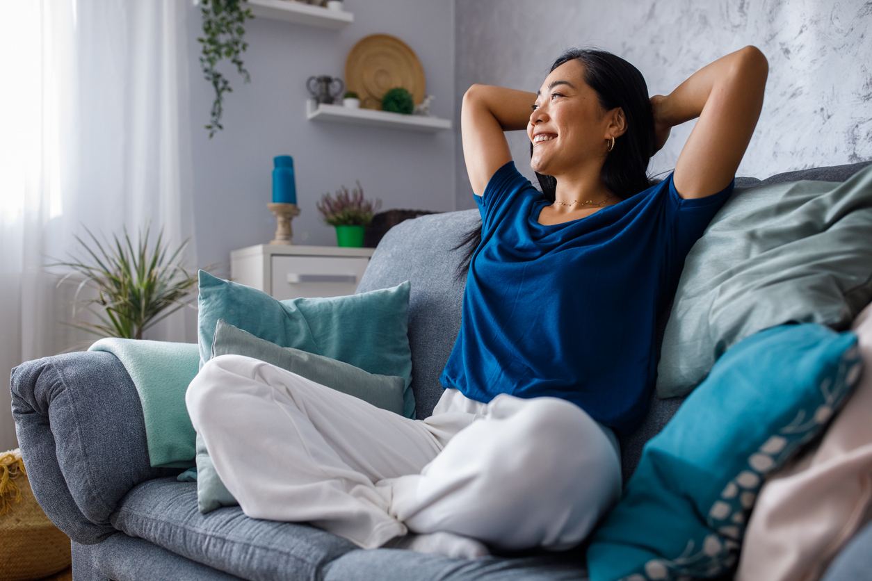 Woman relaxing on couch
